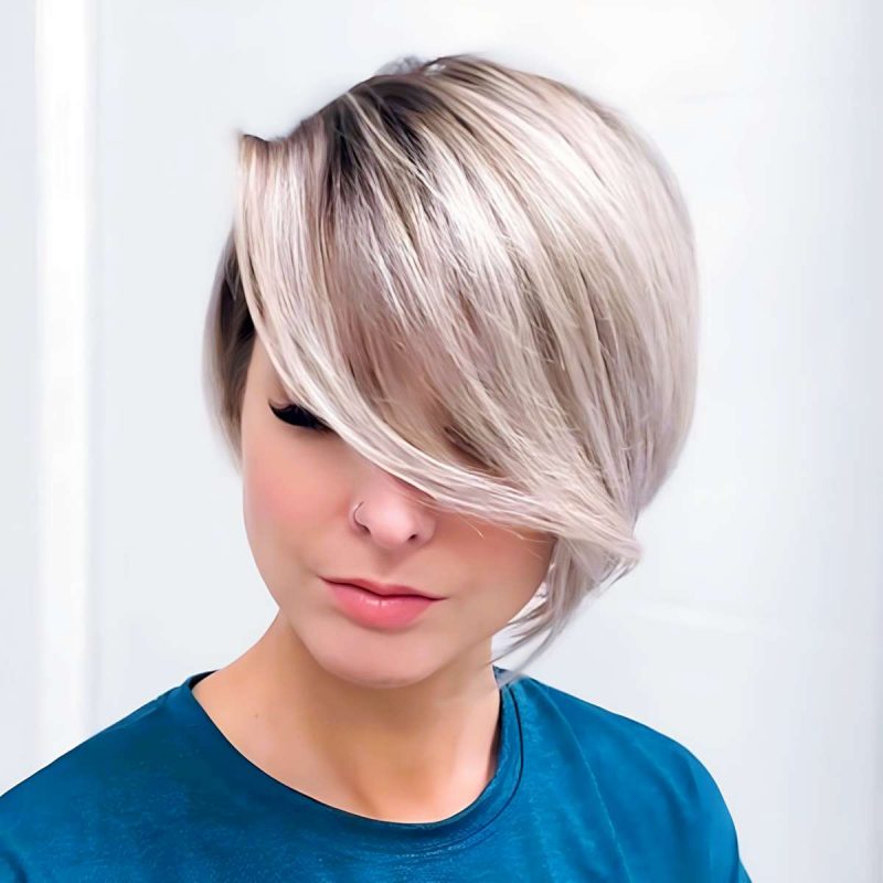 Sleek Platinum Asymmetrical Bob with Long Fringe