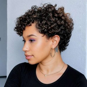 Defined Spiral Curls with Subtle Caramel Highlights Defined Spiral Curls with Subtle Caramel Highlights