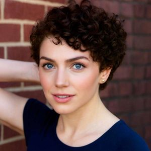 Tightly Defined Curls in a Tapered Sculpted Cut Tightly Defined Curls in a Tapered Sculpted Cut